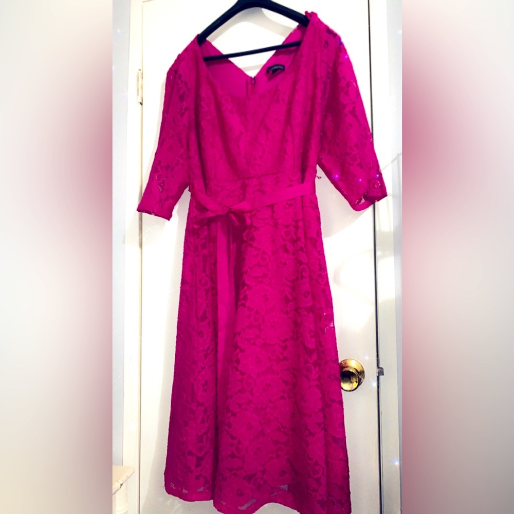 Beautiful lace dress with belt. Only worn twice. Vibrant color.